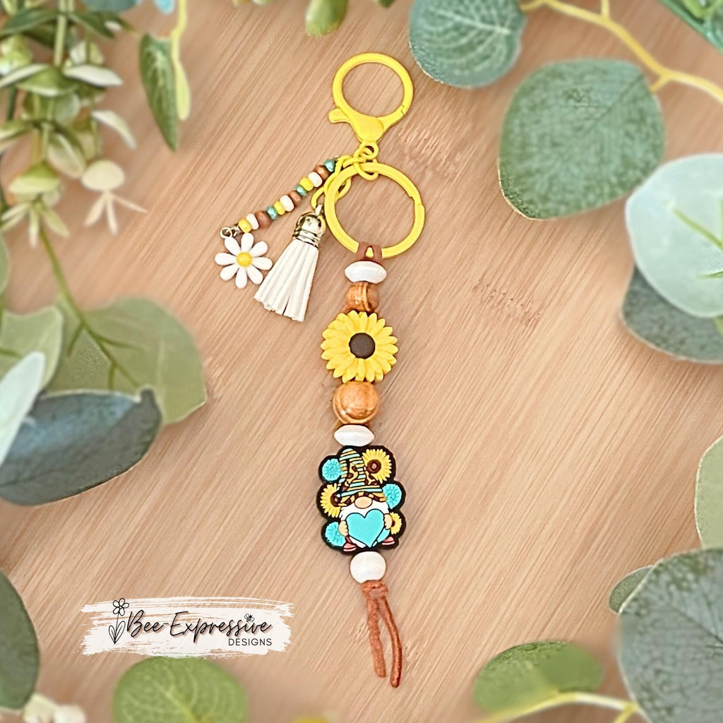 SUNFLOWER / GNOME, keychain! Yellow lobster clasp, keyring, suede cord, wood beads, beaded tassel, with a flower charm!