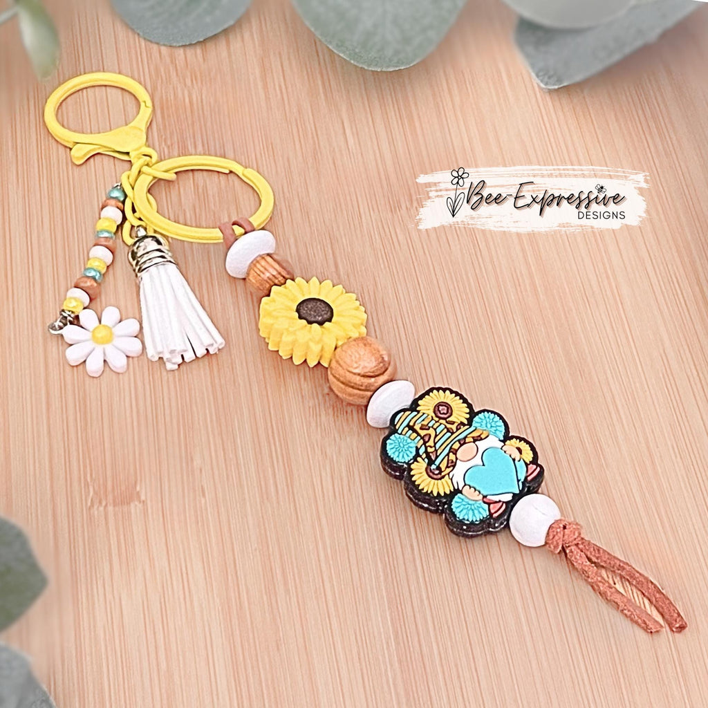 SUNFLOWER / GNOME, keychain! Yellow lobster clasp, keyring, suede cord, wood beads, beaded tassel, with a flower charm!