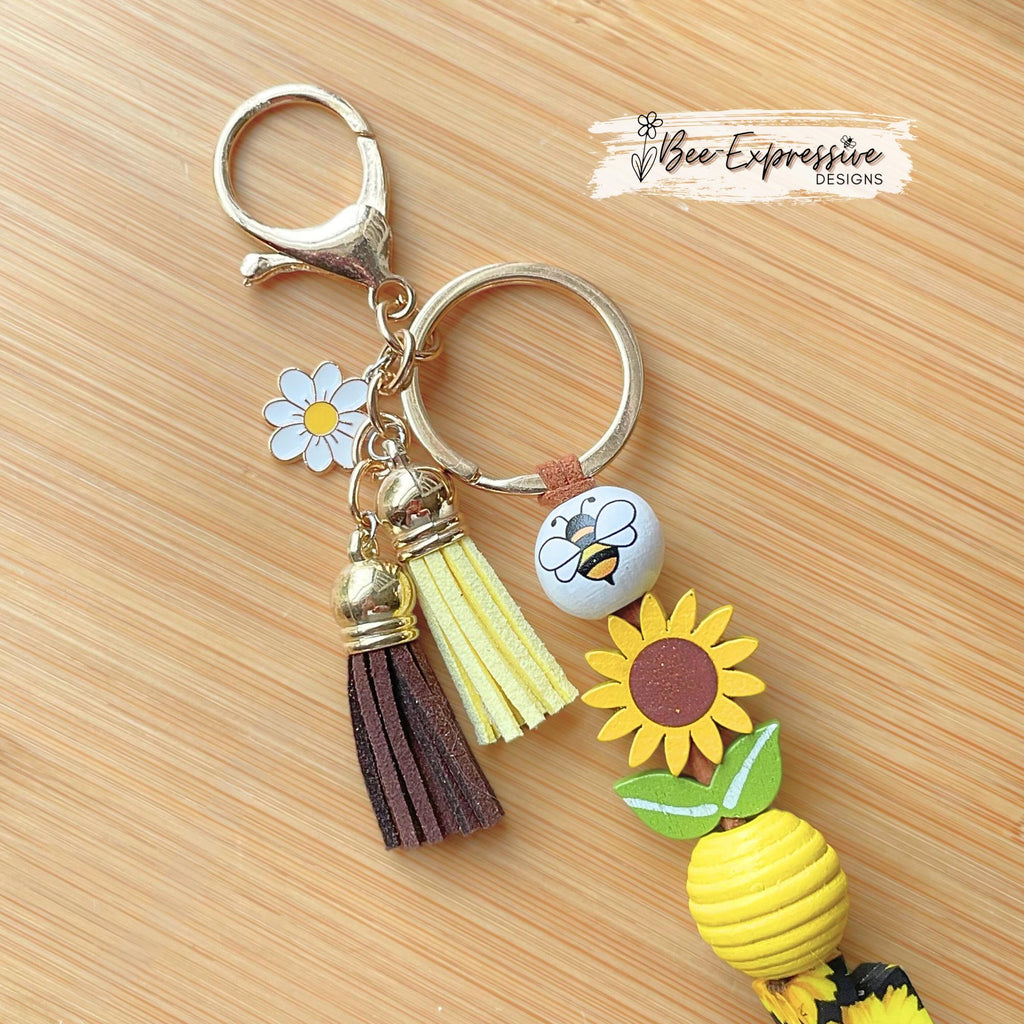 SUNFLOWER & bumble bee, keychain! Lobster clasp, corded, wood sunflower beads, bee bead, silicone sunflower cross, a daisy charm pendant!
