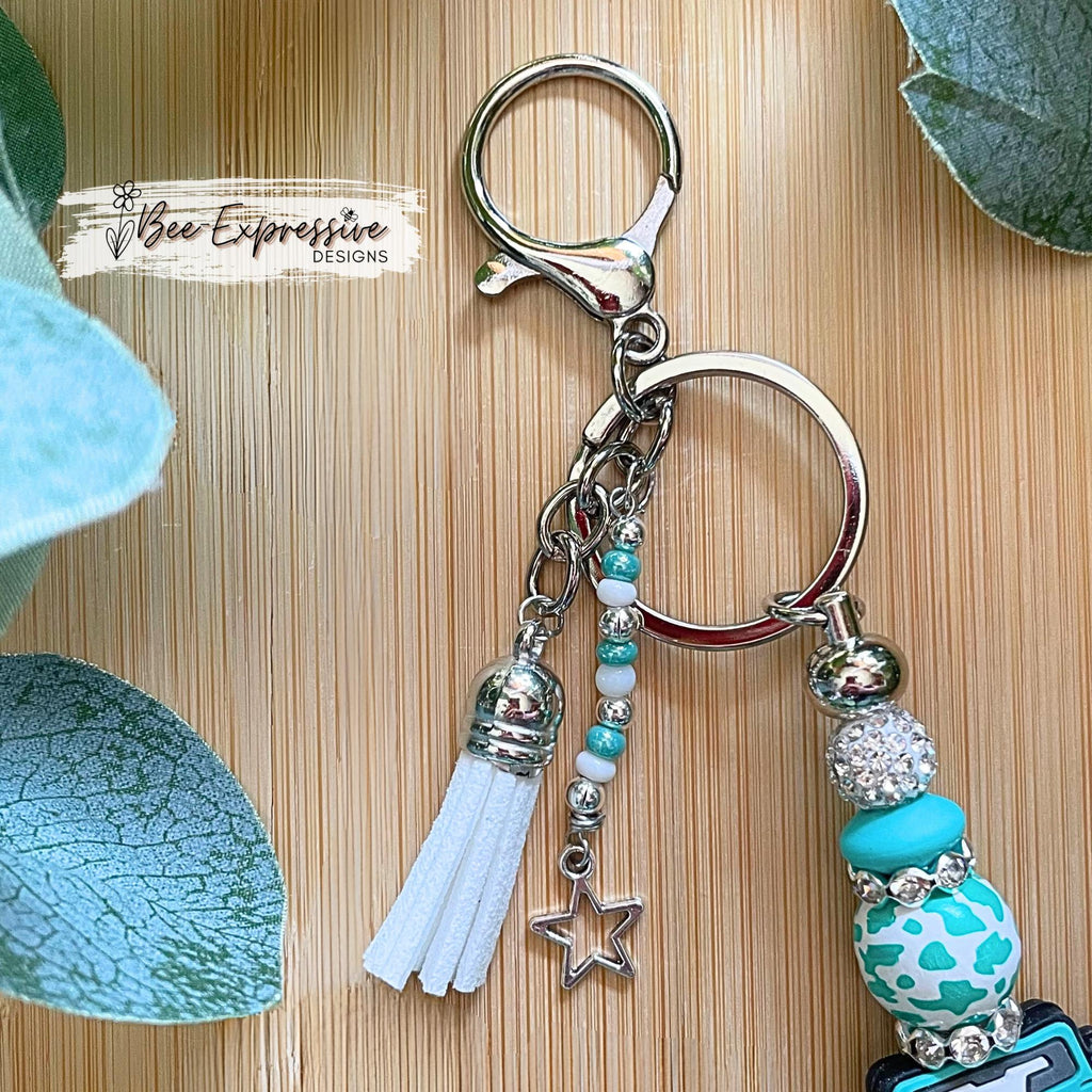 Beaded, 4x4 vehicle keychain! Lobster or swivel clasp, lentil beads, wood animal print bead, rhinestone spacers and tassels!