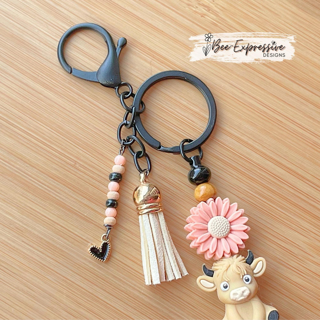 Beige 3D COW, BULL, beaded keychain! Lobster clasp, bead bar, daisy flower bead, silicone & wood beads, beaded tassel with black heart charm