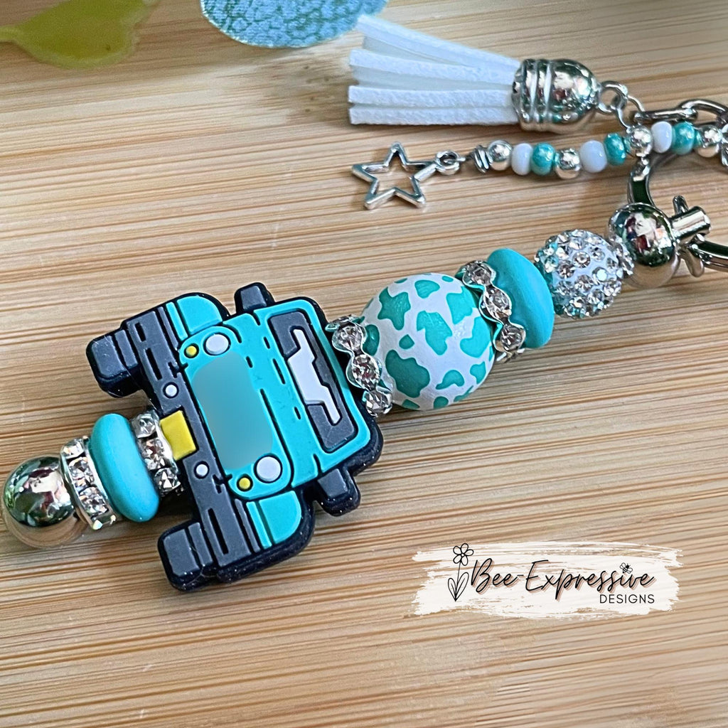 Beaded, 4x4 vehicle keychain! Lobster or swivel clasp, lentil beads, wood animal print bead, rhinestone spacers and tassels!