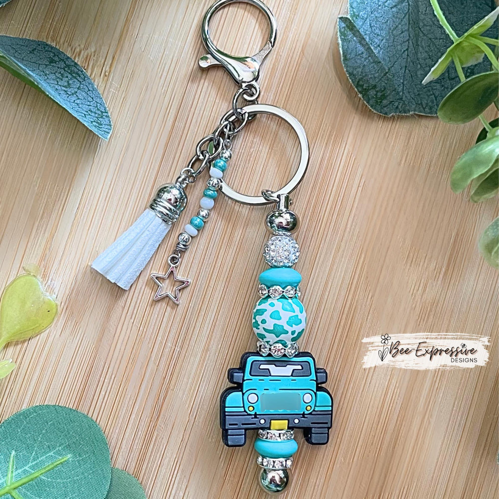 Beaded, 4x4 vehicle keychain! Lobster or swivel clasp, lentil beads, wood animal print bead, rhinestone spacers and tassels!